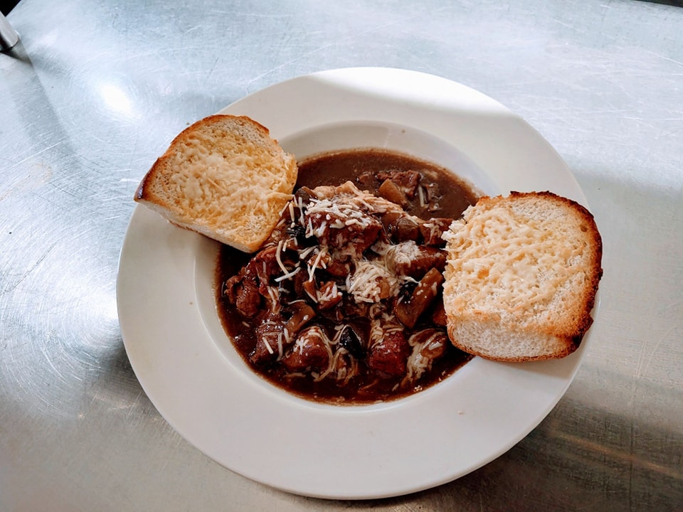 Hearty dish of Beef Tips over Mashed Potatoes