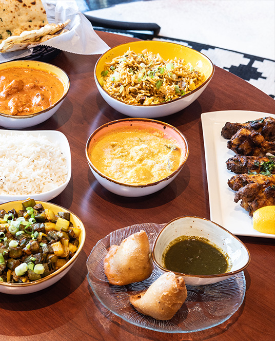 Authentic Indian curry with fresh food, plated in a contemporary oceanfront setting in virginia beach