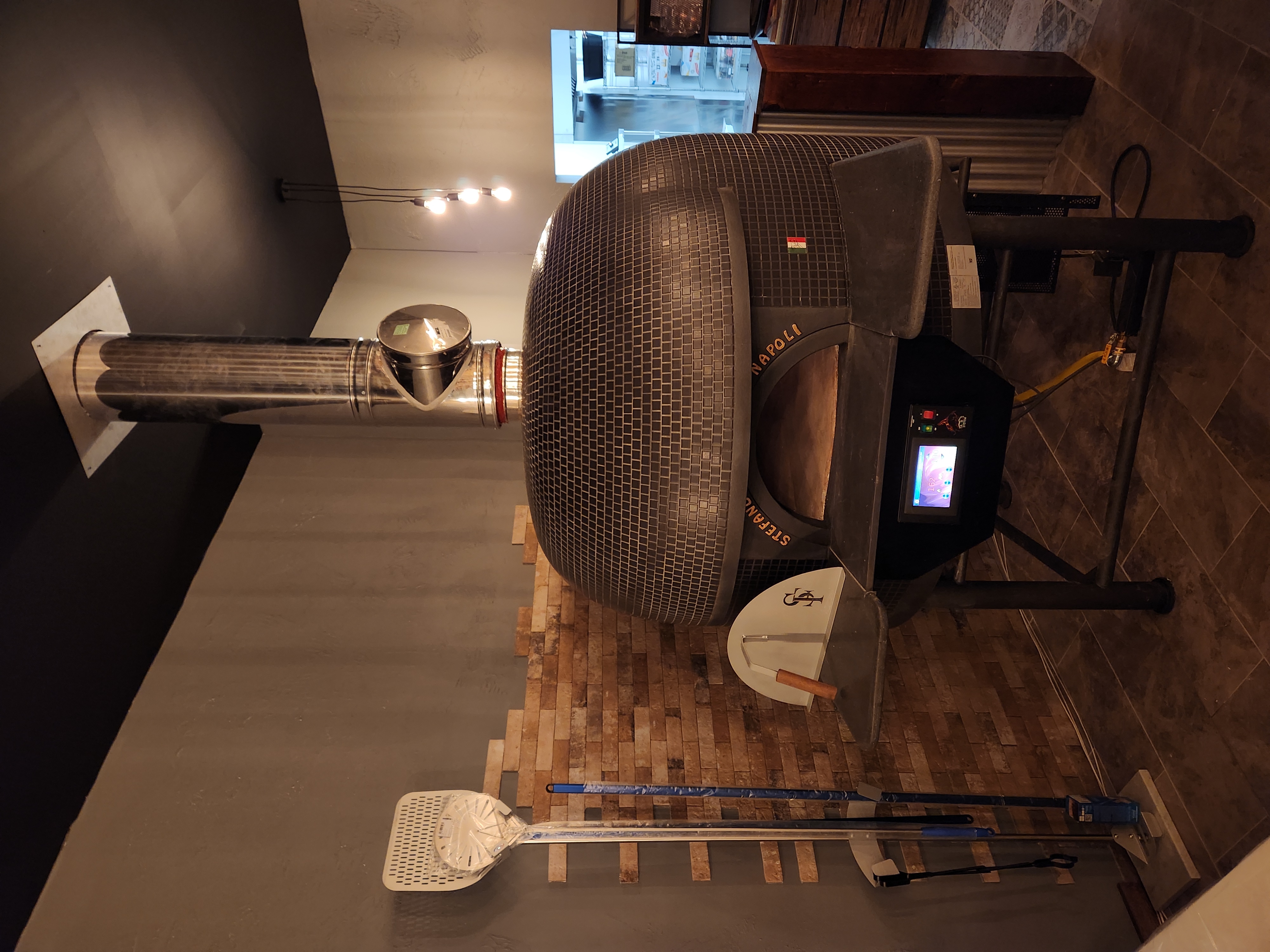Stefano Ferrara Forni propane-wood oven, imported all the way from Naples, Italy. 4th generation oven makers, making the best ovens in the world for more than 90 years!
