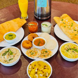 Idly, Vada, Poori/Uthappam, Upma/Pongal, Dosa, Tea, Coffee, Fruit juice and Sweet for just 10.99 $ available on Sat & Sunday from morning 09:00 am to 10:30 am
